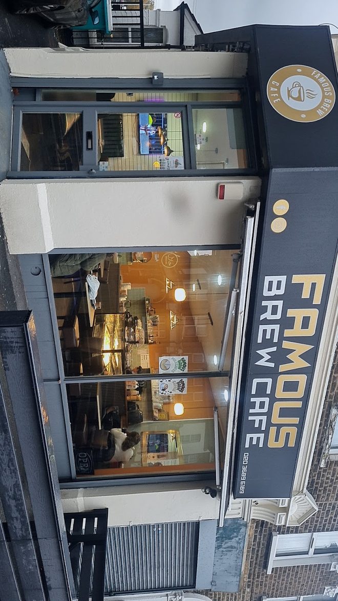Angled view of the dark blue shopfront fascia