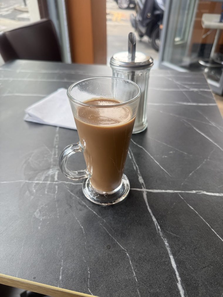 Latte served in a tall glass